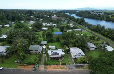 Aerial view of the Innisfail community with pipeline construction works in the foreground.