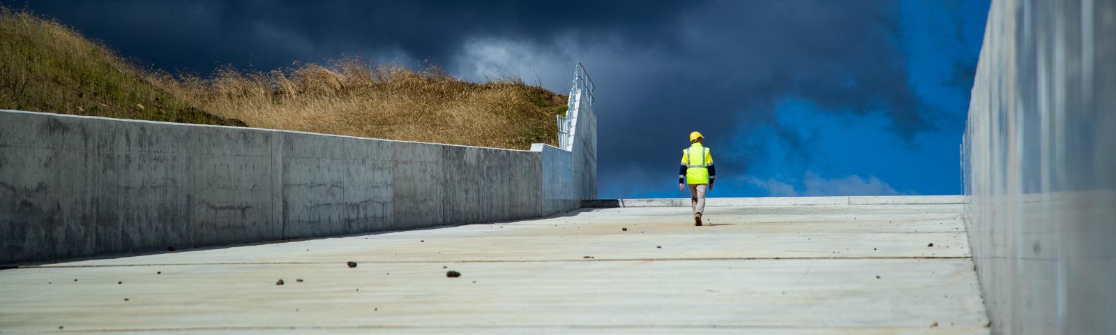 Scottsdale worker walking along spillway