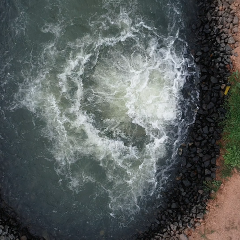 Overhead view of water coming out of pipeline at Macalister Irrigation District in Victoria