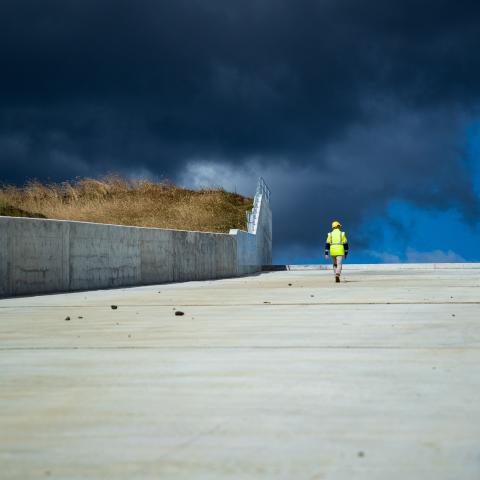 Scottsdale worker walking along spillway