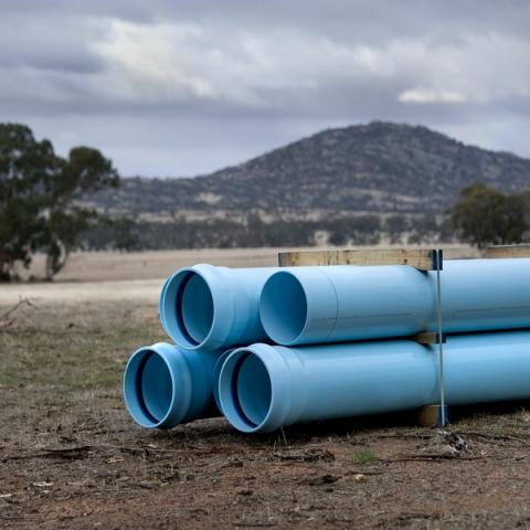 Blue pipes ready for laying at South West Loddon Rural Water Supply Project in Victoria