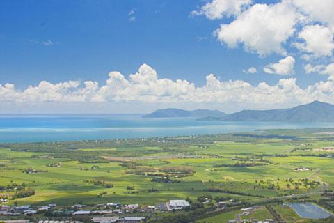 View of the city of Cairns and surrounding area, taken from the Kuranda lookout on a sunny day.