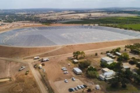Aerial image showing construction of the new Mclaren Vale waste water facility to support the region’s grape industry. Cars and buildings can be seen in the foreground.