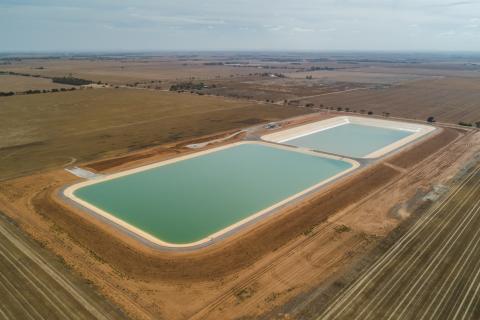 Aerial view of the Northern Adelaide Irrigation Scheme in South Australia. Two holding ponds on a plain