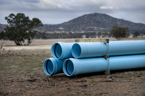 Blue pipes ready for laying at South West Loddon Rural Water Supply Project in Victoria